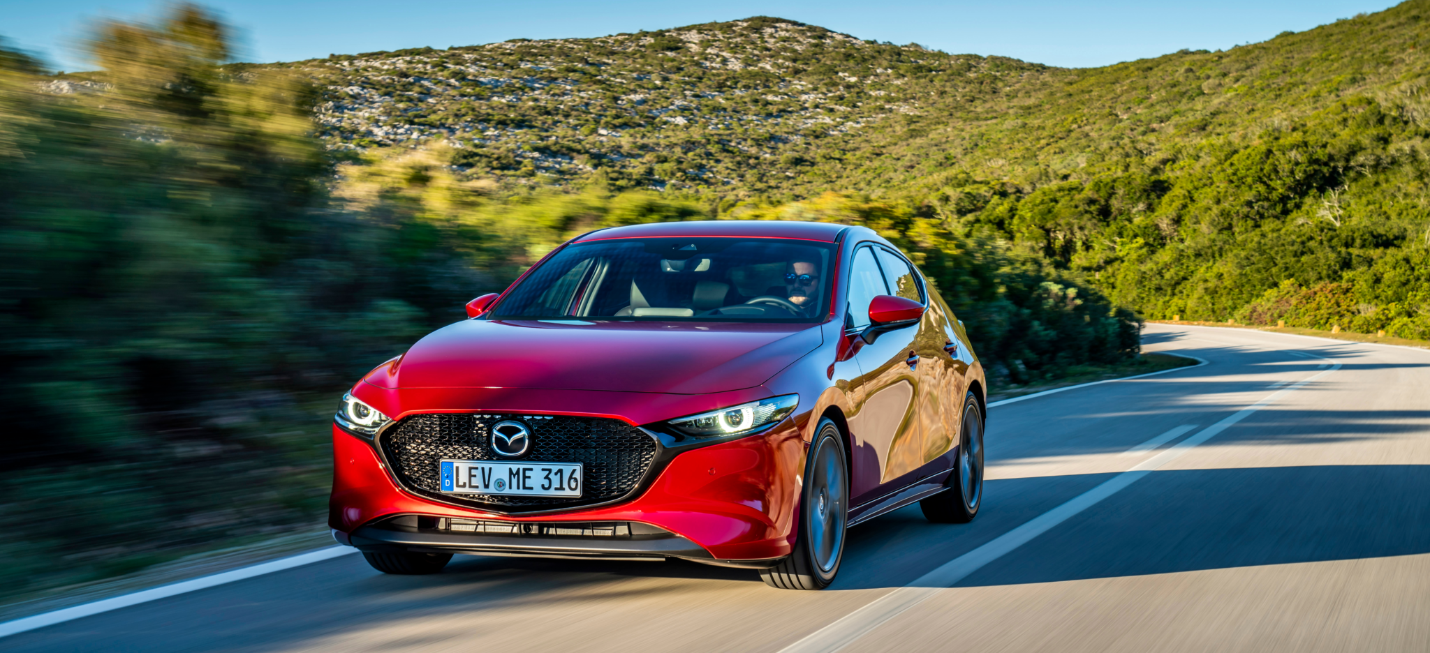Mazda3 HB SoulRedCrystal Action 1 - Mazda lanzará coches eléctricos e híbridos enchufables
